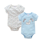 Two baby bodysuits on a white background, one with a dog pattern and the other with a cartoon dog face.