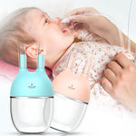 Baby being given a nasal aspirator by an adult