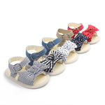Set of children's sandals with various designs on a white background