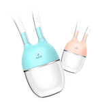 Two glass cups with silicone covers, one blue and one pink, on a white background.
