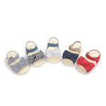 Set of baby sandals with different patterns on a white background