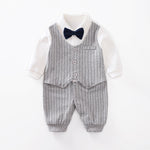 Baby outfit with gray vest and pants set on a white background