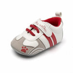 Baby shoe with red and gray design on a white background